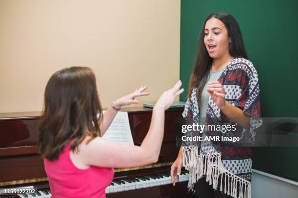 singing lessons - in sung stock pictures, royalty-free photos & images