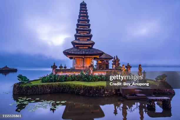view of pura ulan danu bratan temple in bali island of indonesia in the early morning. - pura ulu danau temple stock pictures, royalty-free photos & images