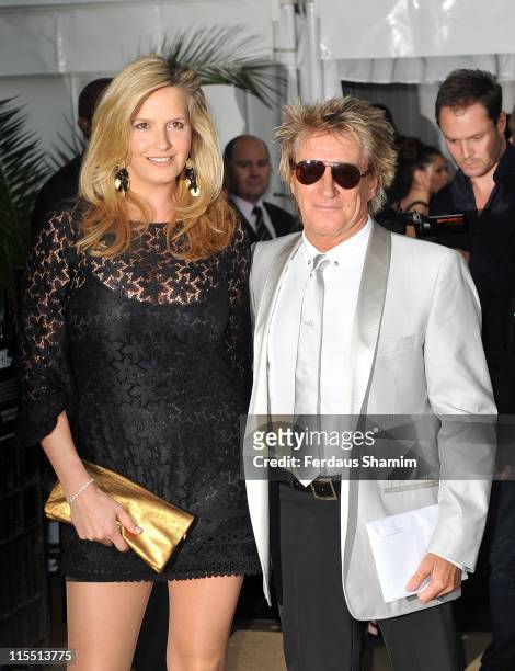 Penny Lancaster and Rod Stewart arrive at the Glamour Women Of The Year Awards at Berkeley Square Gardens on June 7, 2011 in London, England.