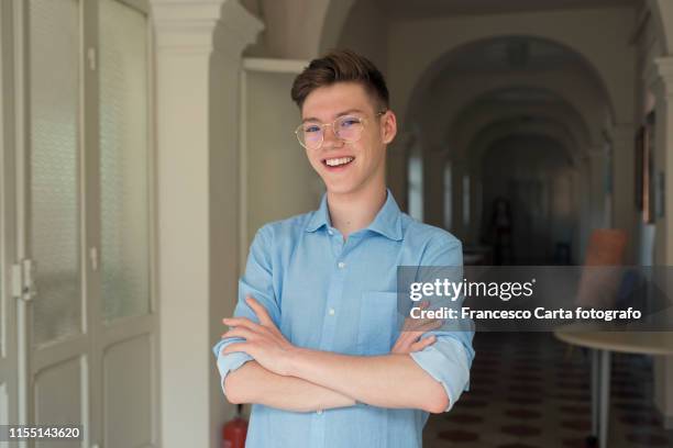 portrait of teenage boy college - high school portrait stock-fotos und bilder
