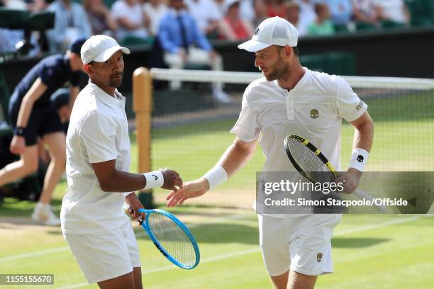 Raven Klaasen and Michael Venus in action against Juan Sebastian Cabal and Robert Farah during their Gentlemen's Doubles Semi Final match on Day 10...