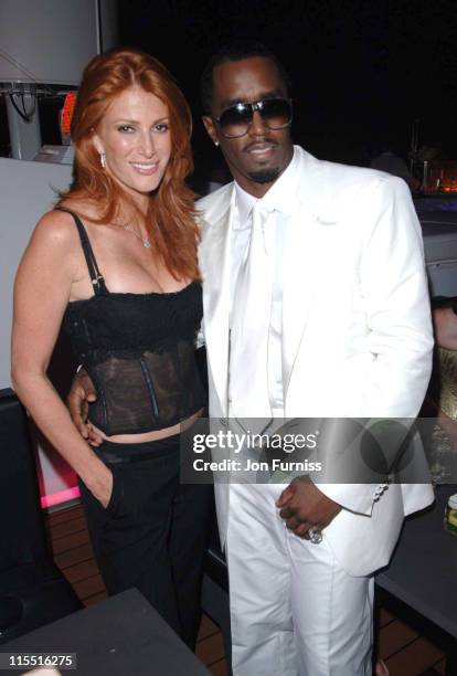 Angie Everhart and Sean "P Diddy" Combs during "Unforgivable" Fragrance Celebration - Dinner - St. Tropez - France in St Tropez, France.