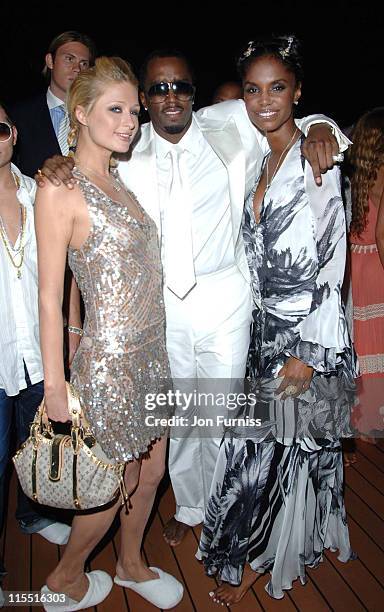 Paris Hilton, Sean "P Diddy" Combs and Kim Porter during "Unforgivable" Fragrance Celebration - Dinner - St. Tropez - France in St Tropez, France.