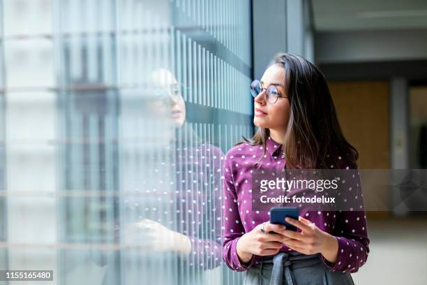 female business professional taking a break from work - contemplation stock pictures, royalty-free photos & images