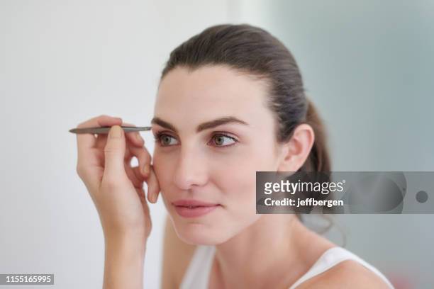all about the brows - eyebrow tweezers stock pictures, royalty-free photos & images
