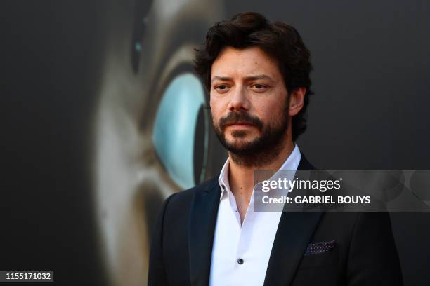 Spanish actor Alvaro Morte poses during a photocall for the presentation of Spanish TV show "La Casa de Papel" 3rd season on July 11, 2019 in Madrid.