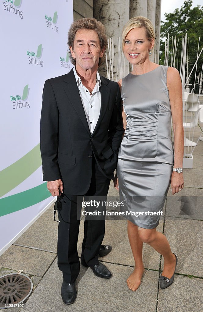 Singer Peter Maffay and Nina Ruge attend the BayWa Charity Gala at