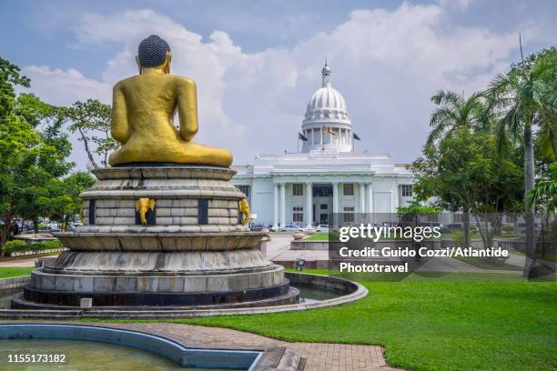 buddha statue at the viharamahadevi park (formerly victoria park) - colombo stock pictures, royalty-free photos & images