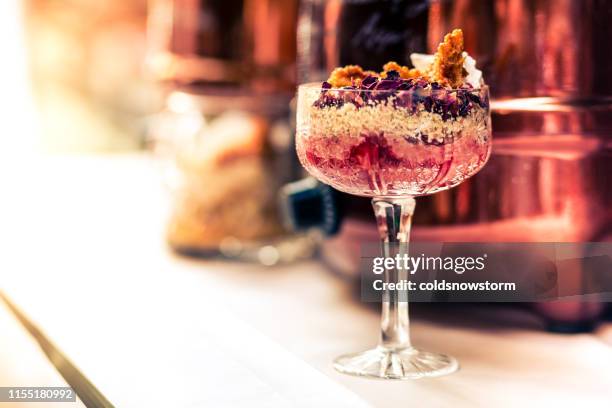 fresh fruit crumble sundae dessert in a glass - ice cream sundae stock pictures, royalty-free photos & images