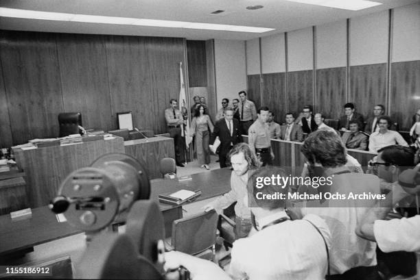 American murderer and member of the Manson Family Susan Atkins and American defense attorney Irving Kanarek enter the court room at the Santa Monica...
