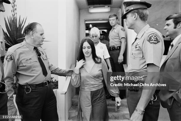 American murderer and member of the Manson Family Susan Atkins is escorted by Los Angeles County sheriffs to the Santa Monica Courthouse to appear in...