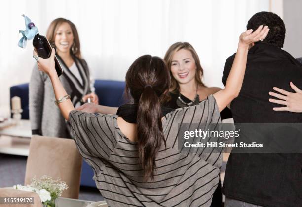 happy couple arriving at party - before the party stock pictures, royalty-free photos & images