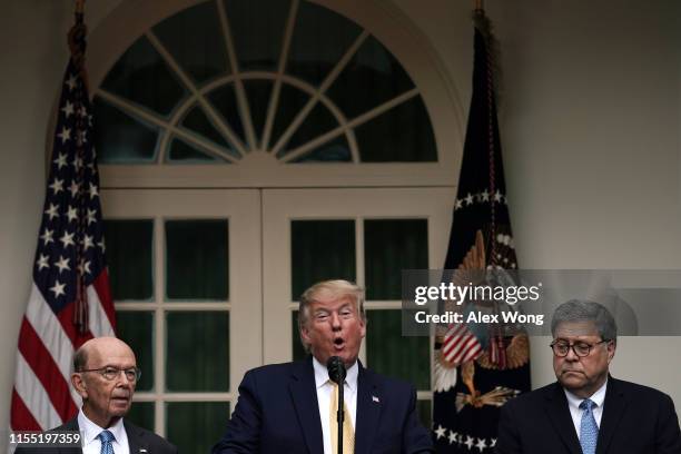 President Donald Trump makes a statement on the census with Secretary of Commerce Wilbur Ross and Attorney General William Barr in the Rose Garden of...