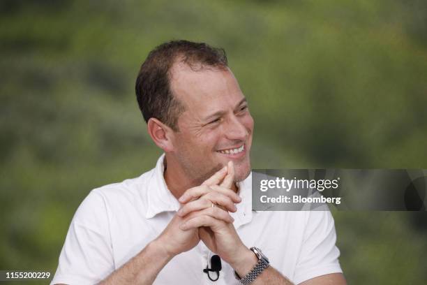 Joey Levin, chief executive officer of IAC/InterActiveCorp, smiles during a Bloomberg Television interview on the sidelines of the Allen & Co. Media...