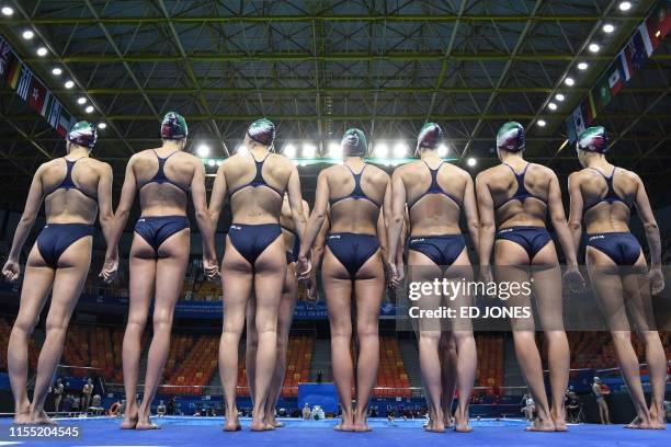 In this picture taken on July 11 Italy's athletes take part in a practice session ahead of the artistic swimming event during the 2019 World...