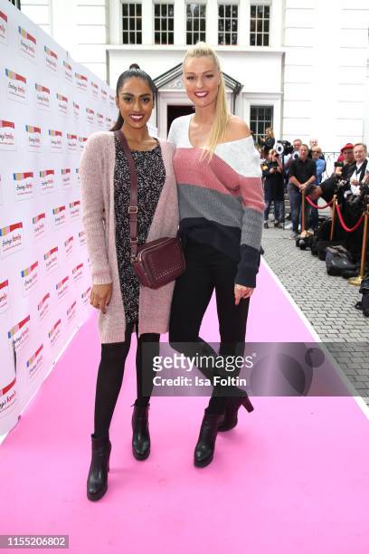 Sayana Ranjan and Miriam Hoeller during the Ernsting's family Fashion Show 2019 on July 11, 2019 in Hamburg, Germany.