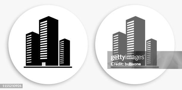 three building black and white round icon - mixed use building icon stock illustrations