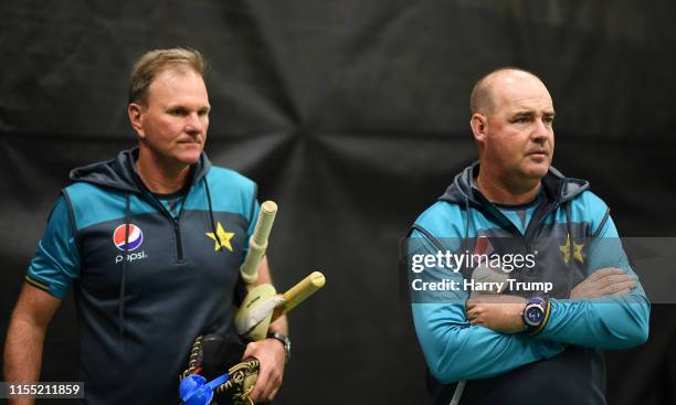 Grant Bradburn, Fielding Coach of Pakistan and Mickey Arthur, Head Coach of Pakistan look on during a Pakistan Press Conference And Nets Session at...