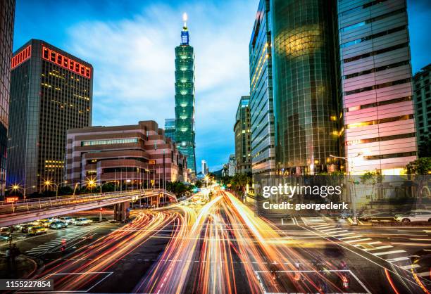 busy taipei streets at dusk - teipei street stock pictures, royalty-free photos & images