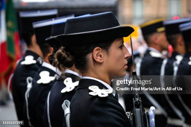 A woman of the french army parading during the celebration of the 14 of july, bastille day, on Languedoc street, Occitanie, Toulouse, France on July...