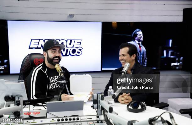 Enrique Santos and John Leguizamo are seen at "The Enrique Santos Show" at I Heart Latino Studios on July 11, 2019 in Miami, Florida.