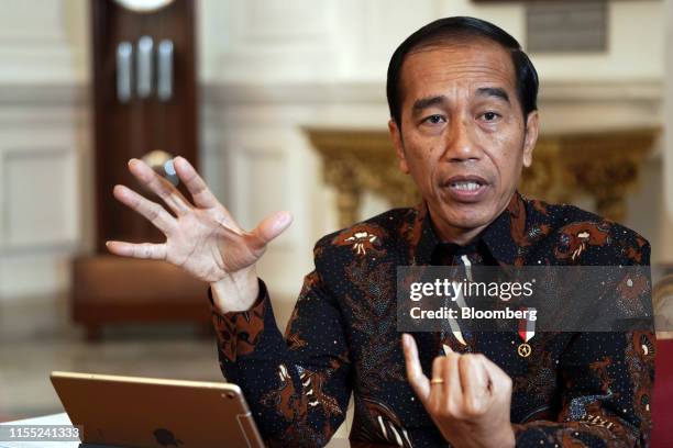 Joko Widodo, Indonesia's president, gestures as he speaks during an interview in Jakarta, Indonesia, on Friday, July 12, 2019. Widodo vowed to...