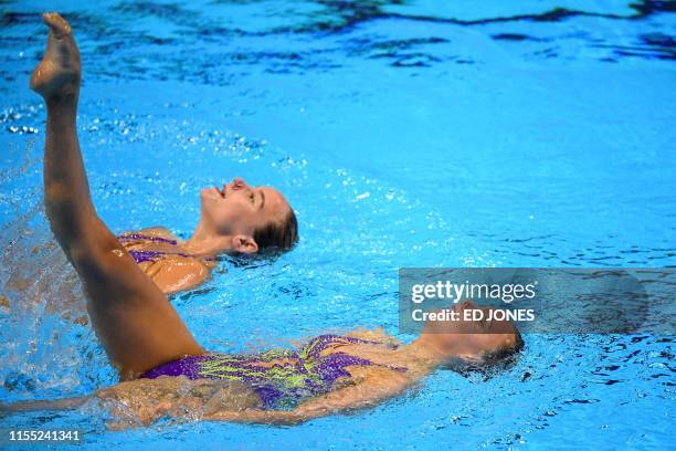 Britain's Kate Shortman and Britain's Isabelle Thorpe compete in the duet technical artistic swimming event during the 2019 World Championships at...