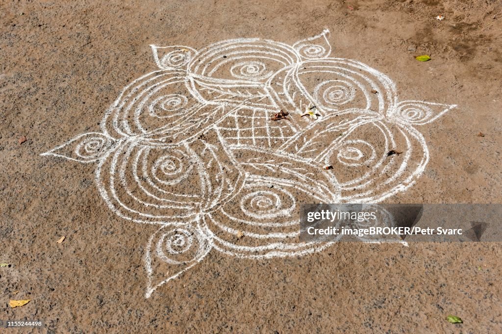 Kolam sand-painting drawn with rice powder, Mahabalipuram, Mamallapuram, India