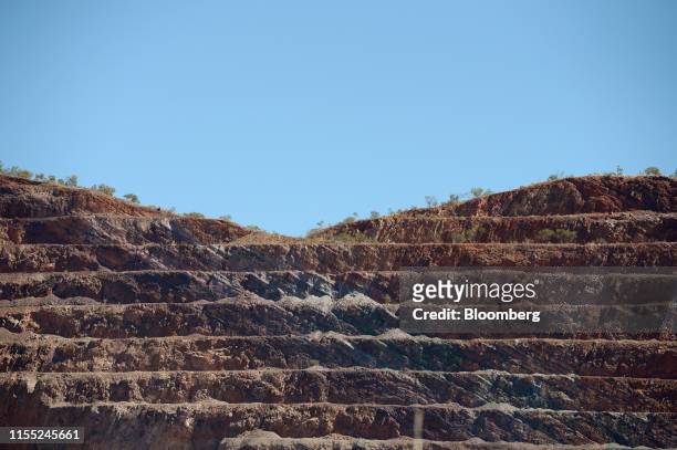 Rock strata forms the wall of the original open-pit mine at the Argyle diamond mine operated by the Rio Tinto Group in the East Kimberly region of...