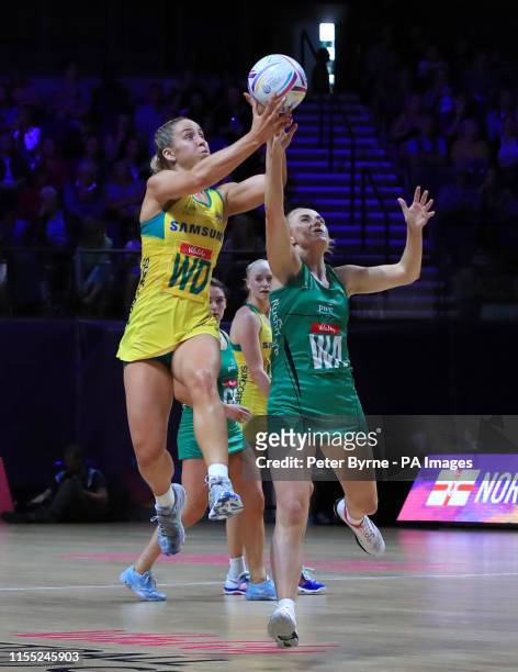 Northern Ireland's Lisa McCaffrey and Australia's Jamie-Lee Price during the Netball World Cup match at the M&S Bank Arena, Liverpool.