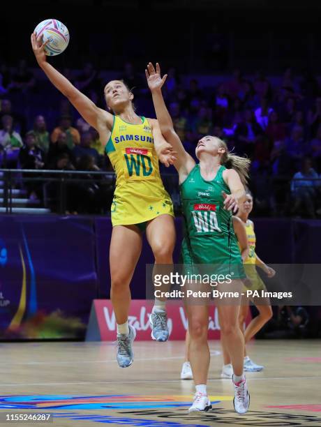 Northern Ireland's Lisa McCaffrey and Australia's Jamie-Lee Price during the Netball World Cup match at the M&S Bank Arena, Liverpool.