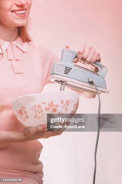 retro stereotypical nineteen fifties portrait of housewife - housewife stock pictures, royalty-free photos & images