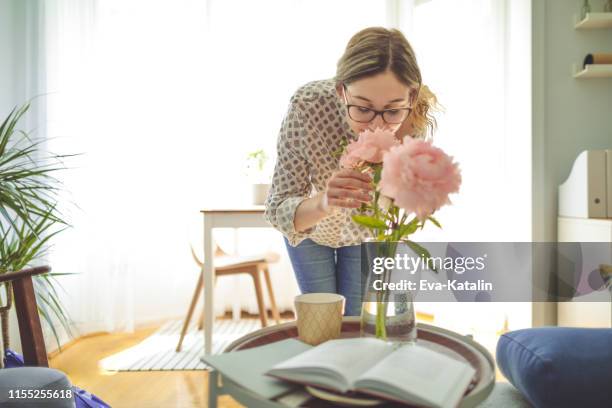 young woman at home - summer indoors stock pictures, royalty-free photos & images