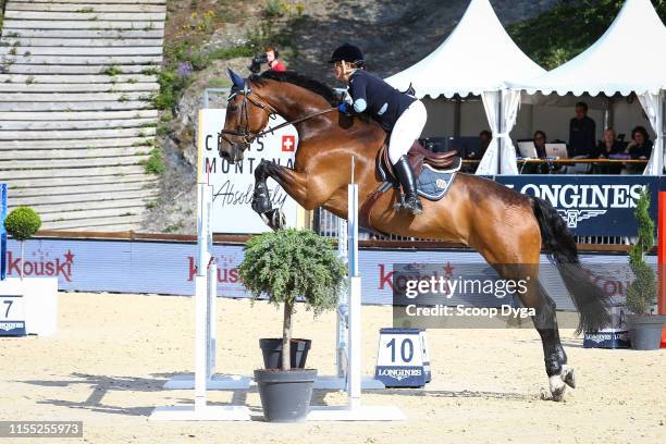 Sabrina Kuhlmann-Schutz OF GERMANY riding Acodetto's Champ during the Jumping Longines Crans-Montana at Crans-sur-Sierre on July 12, 2019 in...