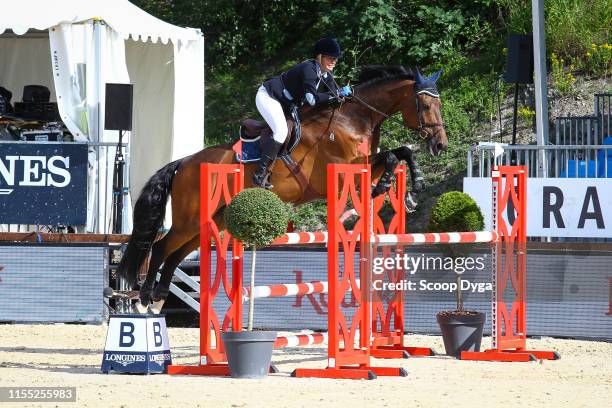 Sabrina Kuhlmann-Schutz OF GERMANY riding Acodetto's Champ during the Jumping Longines Crans-Montana at Crans-sur-Sierre on July 12, 2019 in...