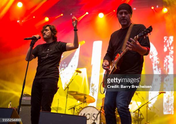 David Usher and Mark Makoway of Moist perform at the Festival d'été de Québec on July 10, 2019 in Quebec City, Canada.