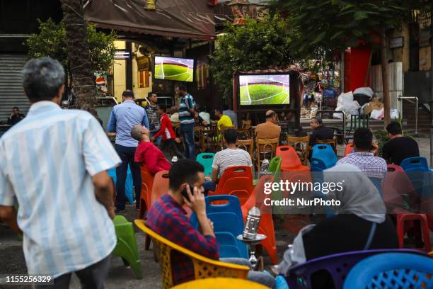 People look the quarter of final match Costa d'Avorio vs Algeria in the street of Cairo, in Bab el-Shaaria quartier, Il Cairo, Egypt on 11 July 2019....