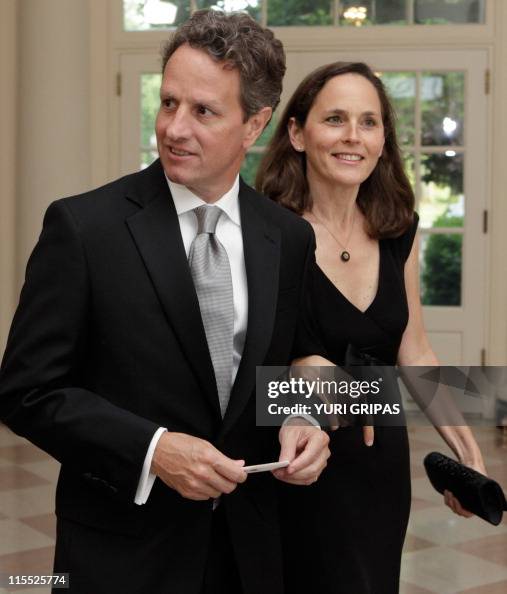 Tim Geithner US Treasury Secretary Tim Geithner with his wife Carole arrive at a ...