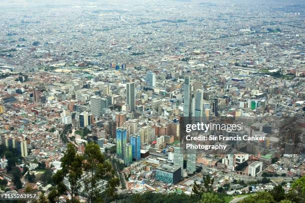 aerial view of bogotá skyline illuminated at daylight in cundinamarca, colombia - cundinamarca bildbanksfoton och bilder