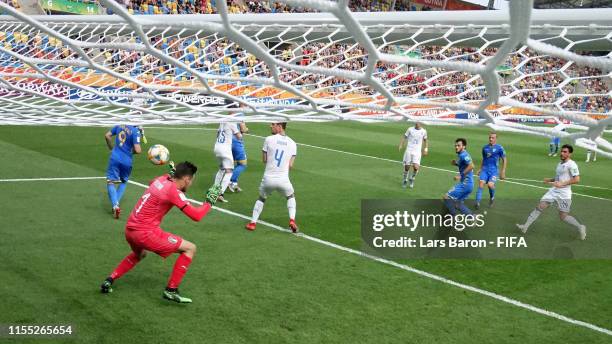 Serhii Buletsa of Ukraine scores his sides first goal past Alessandro Plizzari of Italy during the 2019 FIFA U-20 World Cup Semi Final match between...