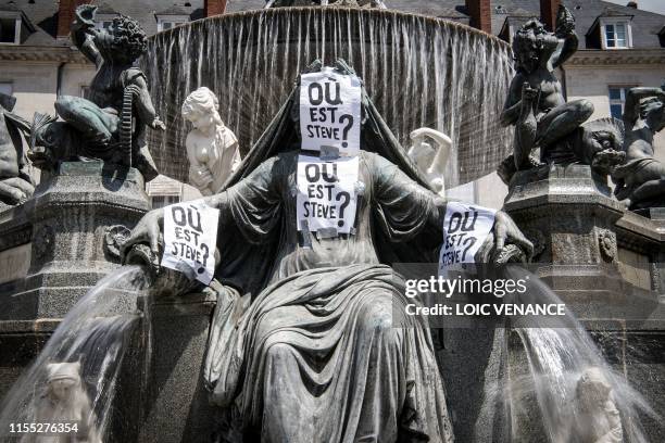 Paper posters reading "Ou est Steve?" have been displayed on the Place Royale fountain, on July 12, 2019 in Nantes, western France, a few weeks after...