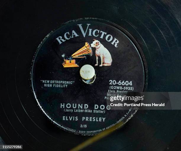 Record of Elvis Presley's Hound Dog decorates part of the room where Toby Leboutillier, host of the MPBN radio program Down Memory Lane, organizes...