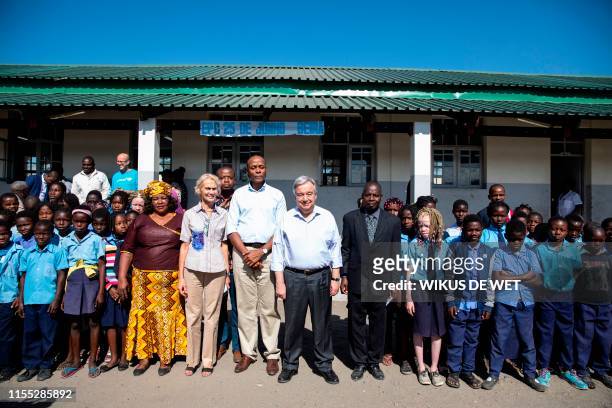 Antonio Guterres , the United Nations Secretary General, poses for a picture with learners and teachers at the Escola 25 de Juhno in Munhava that was...