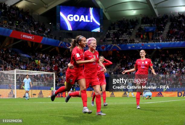 Mallory Pugh of the USA celebrates with teammate Megan Rapinoe after scoring her team's eleventh goal during the 2019 FIFA Women's World Cup France...