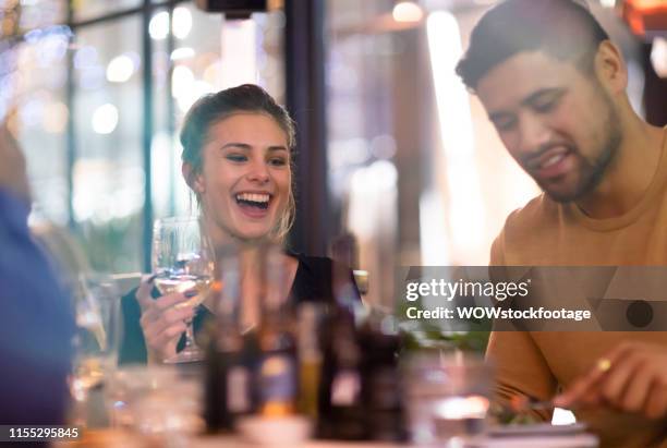 friends laughing at dinner - auckland food bildbanksfoton och bilder