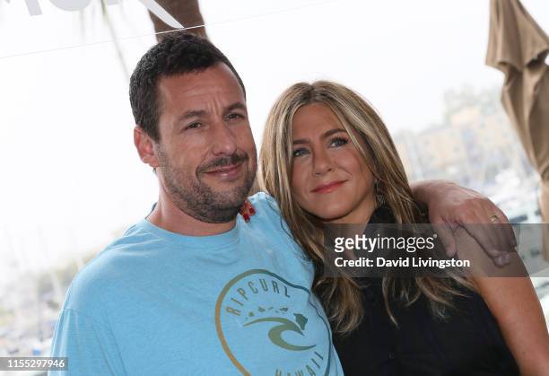 Adam Sandler and Jennifer Aniston attend a photocall of Netflix's "Murder Mystery" at the Ritz Carlton Marina Del Rey on June 11, 2019 in Marina del...