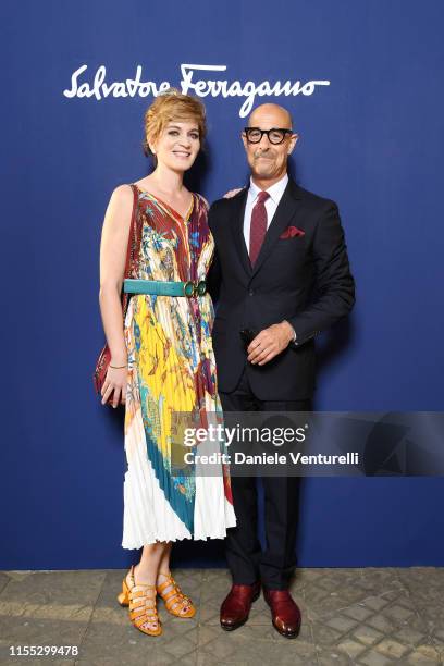 Felicity Blunt and Stanley Tucci attend the Salvatore Ferragamo show during Pitti Immagine Uomo 96 on June 11, 2019 in Florence, Italy.