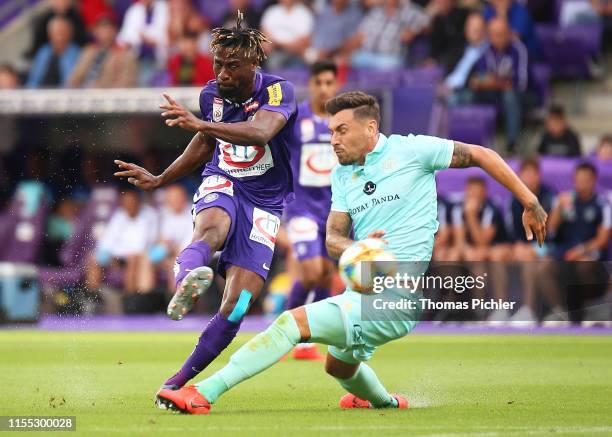 Bright Edomwonyi of Austria Wien and Grant Hall of Queens Park Rangers compete during the friendly match between Austria Wien and Queens Park Rangers...