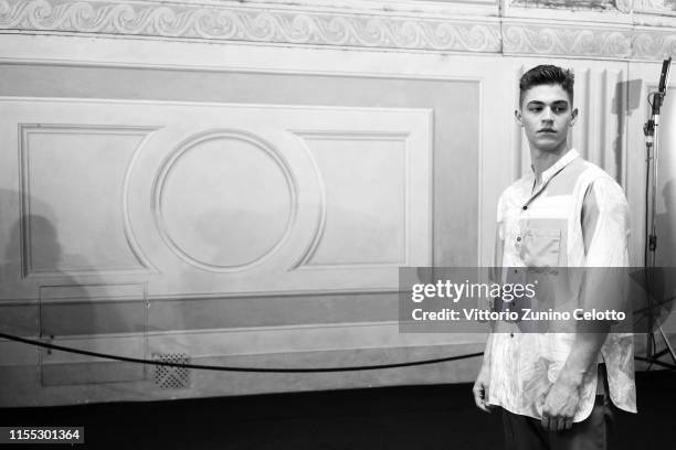 Hero Fiennes Tiffin poses during the Salvatore Ferragamo backstage in Piazza della Signoria during Pitti Immagine Uomo 96 on June 11, 2019 in...