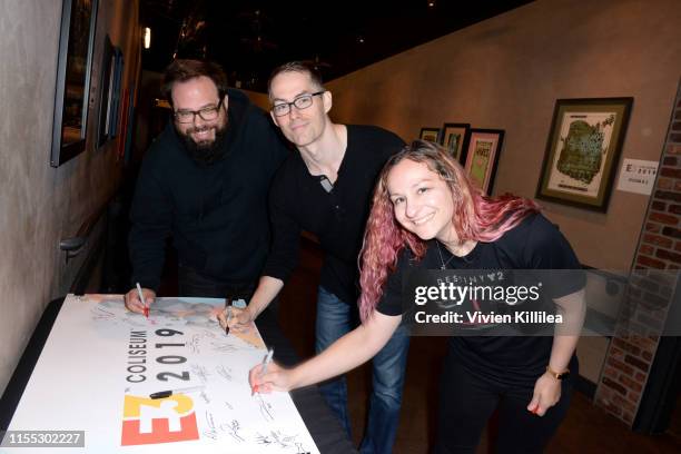 Luke Smith, Mark Noseworthy, and Raylene Deck pose backstage at The Future of Bungie and Destiny 2 panel during E3 2019 at the Novo Theatre on June...